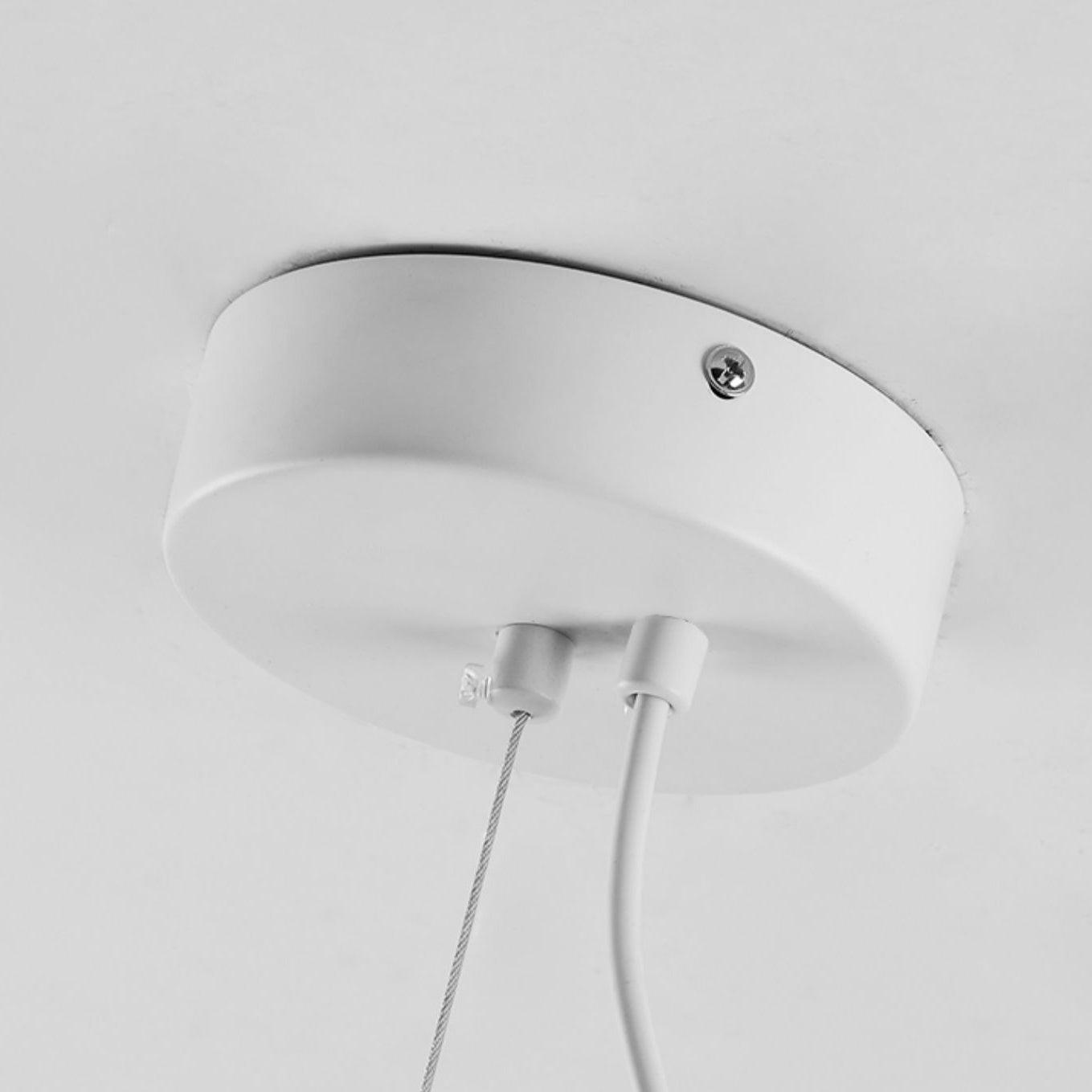 Lampada a sospensione a forma di focaccina cotta al vapore