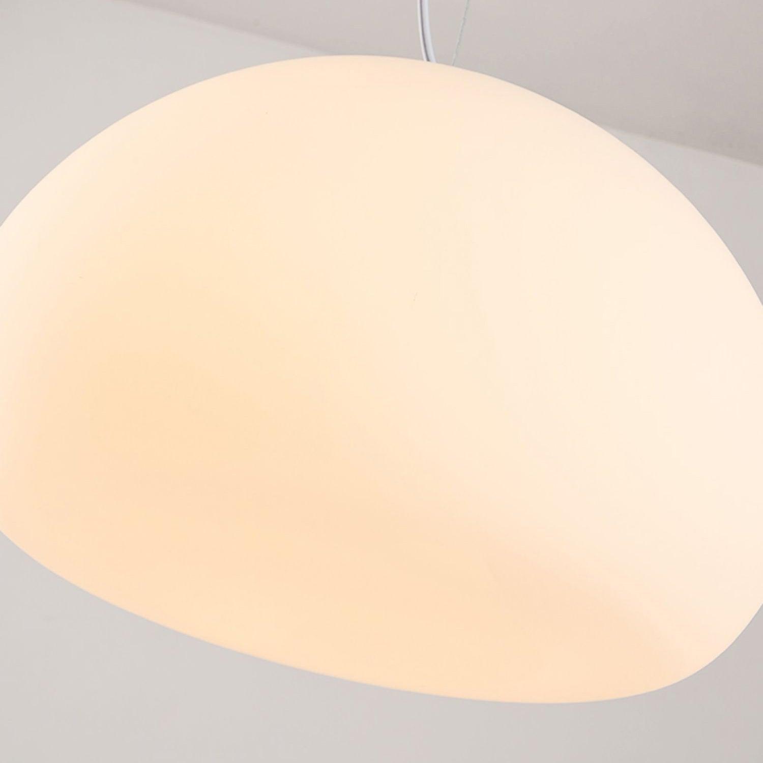 Lampada a sospensione a forma di focaccina cotta al vapore